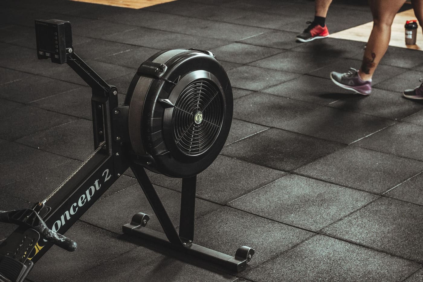 A Concept2 RowErg on a gym floor with the damper lever set high at 8, the default most people never question