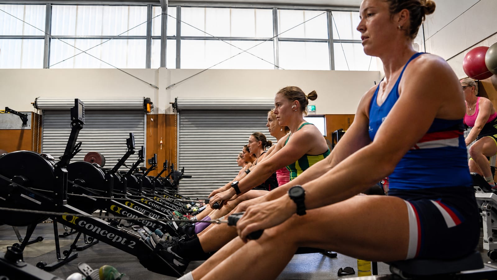 Elite rowers training hard on RowErgs in the gym